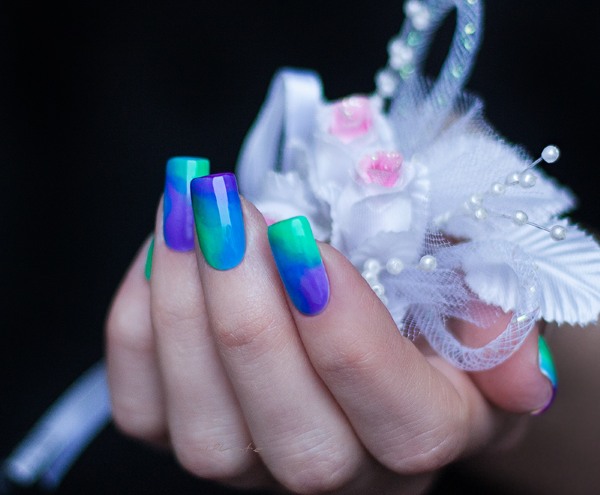 Gel polish for short nails - new designs Bluesky, Cat's eye, Sliders, watercolor technique. A photo