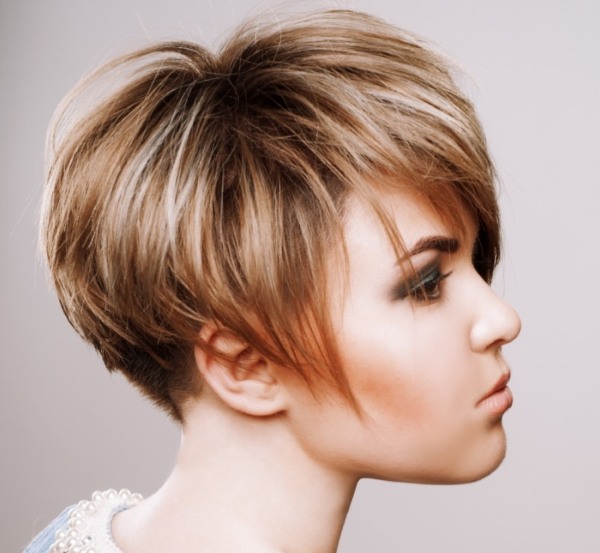 Highlights on dark medium hair. Fashionable color on tips, back and front view, photo