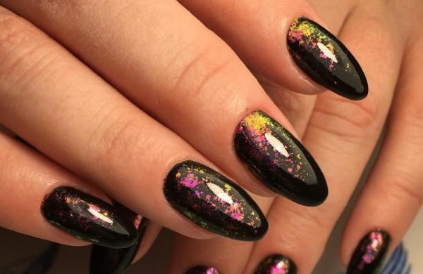 Nail design in black, with black varnish, gold, silver, rhinestones. New items and photos