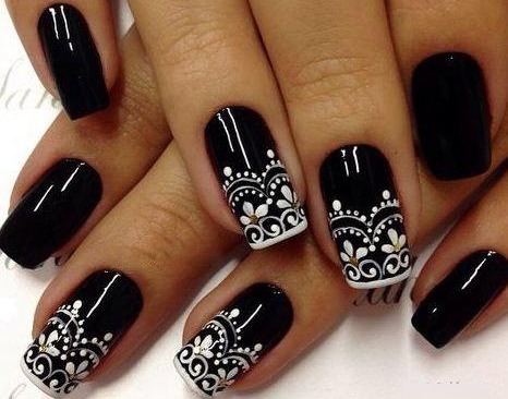 Nail design in black, with black varnish, gold, silver, rhinestones. New items and photos