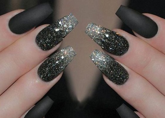 Nail design in black, with black varnish, gold, silver, rhinestones. New items and photos