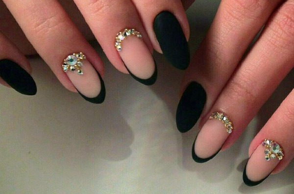 Nail design in black, with black varnish, gold, silver, rhinestones. New items and photos