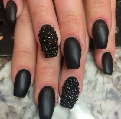 Nail design in black, with black varnish, gold, silver, rhinestones. New items and photos