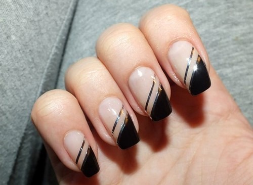 Nail design in black, with black varnish, gold, silver, rhinestones. New items and photos