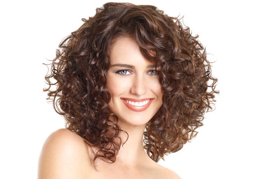 Fashionable beautiful women's haircuts for curly hair of medium length: with bangs and without, not requiring styling. New for 2020