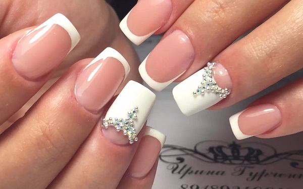 French on nails. Photo 2020, new items: white gel polish with a pattern, spring, autumn, summer, winter designs and ideas