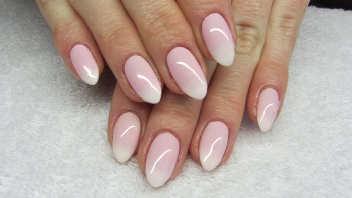 French on almond-shaped nails 2020: classic, moon, with rhinestones, stones, pattern, lace, inverted, reverse, geometric. A photo