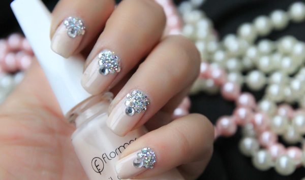 Manicure design on short nails with gel polish. Photo for winter, spring, summer, autumn 2020, dark manicure, with rhinestones, sparkles, acrylic powder, french