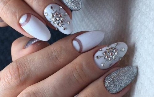 Manicure gel polish with rhinestones. Fashion trends, photos with broths, sparkles, rubbing, french, the most beautiful design