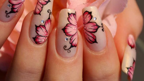 Fiori sulle unghie con smalto gel - idee per manicure e nuovi design: giacca di servizio, fiori voluminosi, delicati, trasparenti, bellissimi. Una foto