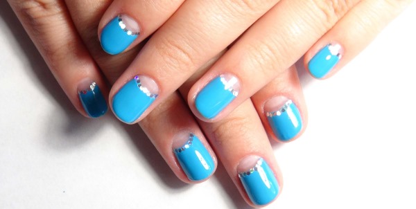 Blue jacket on the nails. Photo of new manicure with a pattern, rhinestones, sparkles, design ideas for spring, winter and summer