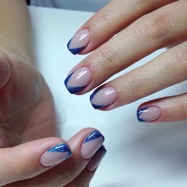 Blue jacket on the nails. Photo of new manicure with a pattern, rhinestones, sparkles, design ideas for spring, winter and summer