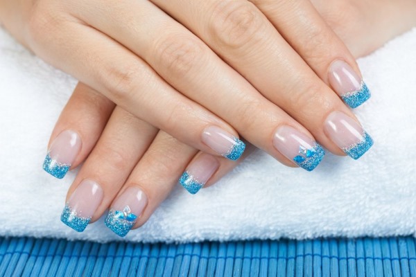 Blue jacket on the nails. Photo of new manicure with a pattern, rhinestones, sparkles, design ideas for spring, winter and summer