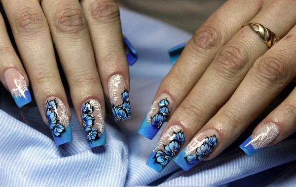 Blue jacket on the nails. Photo of new manicure with a pattern, rhinestones, sparkles, design ideas for spring, winter and summer