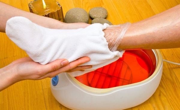 Paraffin foot baths with soda, hydrogen peroxide, sea salt, apple cider vinegar, mustard, chamomile, against nail fungus, relaxing, massage. Recipes