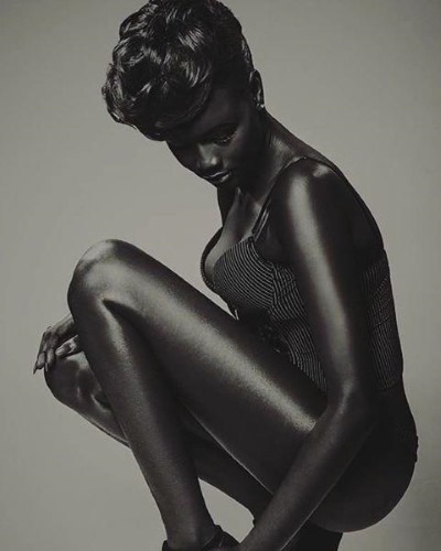 Models with unusual appearance. Photo of a girl, men by nature, skin color