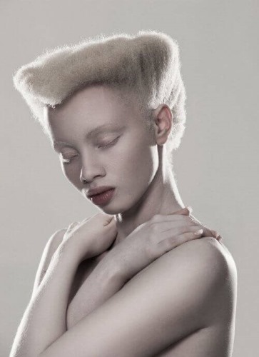 Models with unusual appearance. Photo of a girl, men by nature, skin color