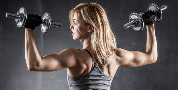 Shoulder exercise for girls in the gym. Video tutorials, photo