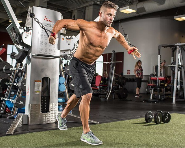 Crossover Triceps Extension. Technique with a rope, straight handle, one pigtail, two hands