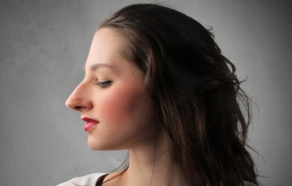 The girl has a long nose. Photos before and after rhinoplasty