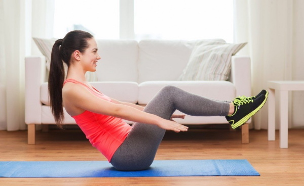 Lifting the body on the press, lying on your back, incline bench with fixing the legs, kettlebell, weight. What muscles work